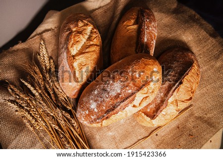 Rustic baked bread with wheat strands - Top View