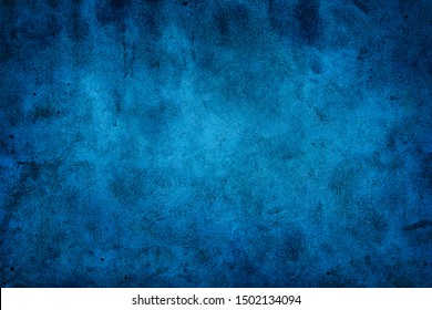 Rustic blue wall background with darker black grungy border and vintage texture design.
