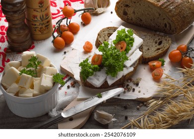 Rustic Bread with Feta, Parsley, and Cherry Tomatoes, Fresh Ingredients on Wooden Board. Feta-Topped Bread with Herbs and Tomatoes, Rustic Kitchen Setup. - Powered by Shutterstock