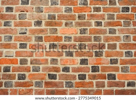 rustic brick wall with old brick texture and repetitive patterns