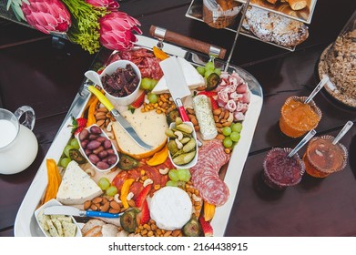 Rustic Buffet Style Meal With Cheese And Cured Meat Platter 