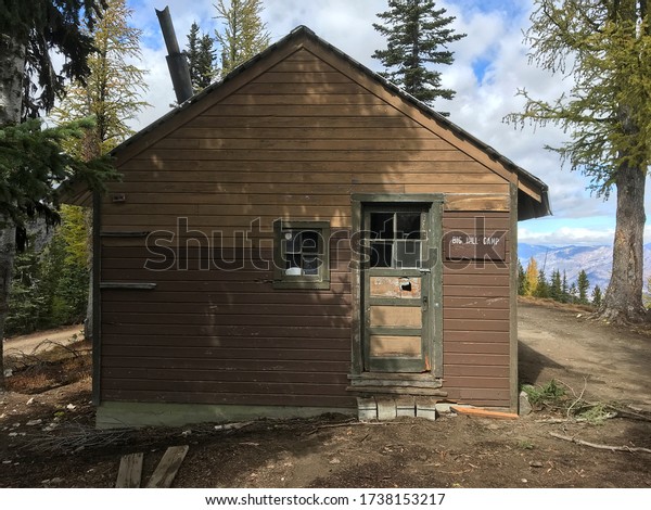 Rustic Cabin\
Exterior In The Mountains Off The\
Grid
