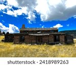 Rustic cabin under blue sky
