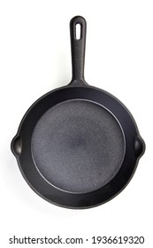 Rustic Cast-iron frying pan, isolated on white background. High resolution image.