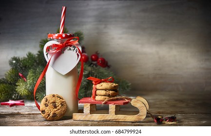 Rustic Christmas Background With Milk And Cookies To Santa