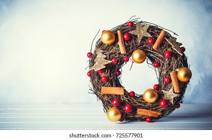 Rustic Christmas wreath with decorations - Powered by Shutterstock