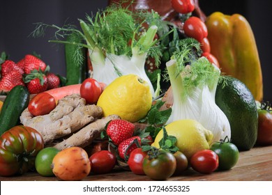 
rustic composition of fruit and vegetables in a warm light