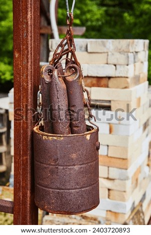 Rustic Counterweight System with Chain in Outdoor Setting