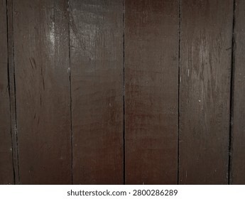 Rustic dark wood panel background featuring natural texture and subtle grain patterns. Perfect for advertising, website banners, packaging, presentations, and graphic design.