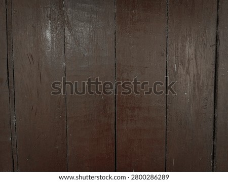Rustic dark wood panel background featuring natural texture and subtle grain patterns. Perfect for advertising, website banners, packaging, presentations, and graphic design.