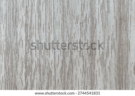 Rustic distressed whitewashed wood texture providing a neutral blank background in modern design projects effortlessly creating a vintage aesthetic.