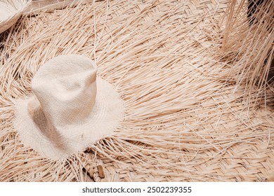 Rustic Elegance: A Straw Hat Amidst a Bed of Wheat Stalks (FITUR, Madrid, Spain) - Powered by Shutterstock