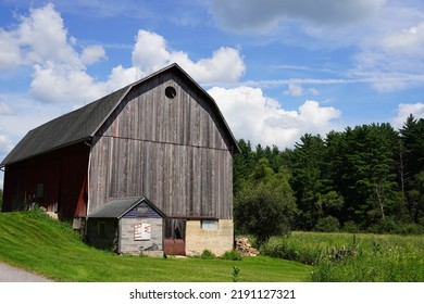 Rustic Farmhouse Sits On Countryside 