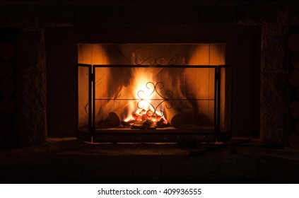 Rustic Fireplace With Fire Grid Protection Screen


