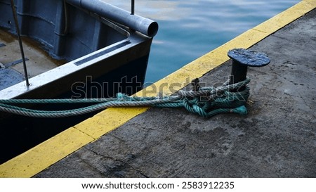 Similar – Image, Stock Photo Fishing boat moored in ocean water