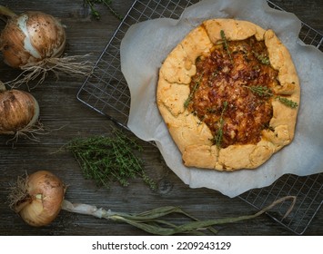 Rustic French Onion Tart And Raw Onions.