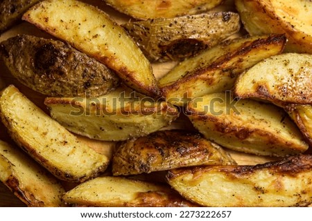 Rustic fried potatoes in full screen. Fried food as a background