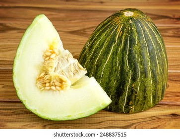 Rustic gourmet christmas melon on wooden background
