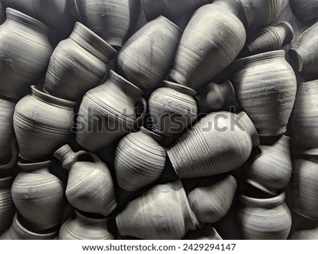Rustic gray ceramic jugs background. Seamless pattern.