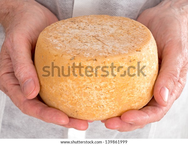 Rustic hand made\
gourmet cheese with\
producer