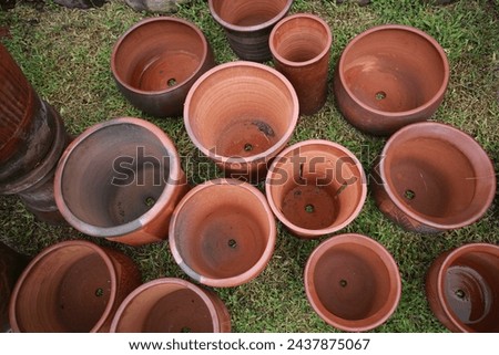 Rustic handmade ceramic clay brown terracotta cups souvenirs at street handicraft market