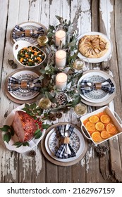 Rustic Holiday Table Spread With Ham, Sweet Potatoes, Pear Galette And Squash Panzanella Salad