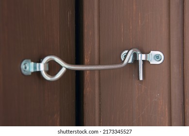 Rustic hook and eye door lock for doors locking.
