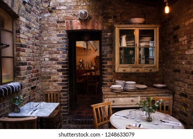 Rustic Interior Of Cozy Restaurant. Loft Style, Modern Dining Place.