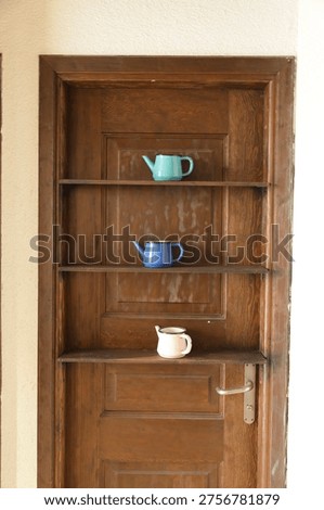 Rustic Interior Design with Decorative Teapots, Creative Home Decor Using Antique Doors, Vintage Wooden Door Repurposed as Shelf