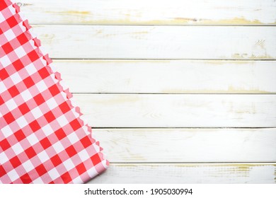 Rustic Italian Cooking Template - Top View Of Vintage Wooden Table With A Red Checked Tablecloth With Copy Space.