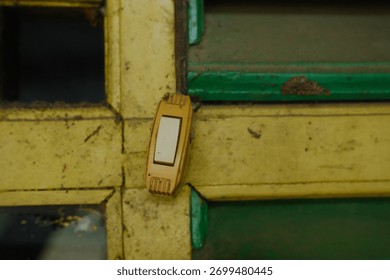 Rustic light switch beckons from aged wall, inviting a touch of vintage charm and characterful detail to your project, with unique retro appeal