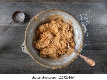 Rustic mixing bowl with peanut butter balls candy ingredients flat lay - Powered by Shutterstock