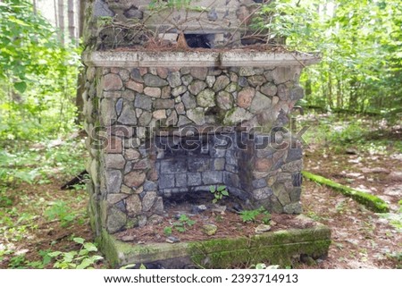 Rustic old abandoned fireplace from 1940's POW camp in the Chippewa National Forest, northern Minnesota USA
