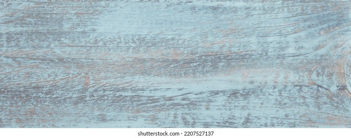 Rustic Old Shabby Light Blue Wood Board Wall Background. Wooden Vintage Style Texture. Large Wood Surface Panel With Peeling Paint. Wide Angle Wallpaper Or Web Banner With Copy Space For Design