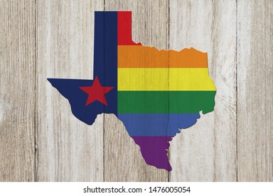 A Rustic Old Texas Pride Flag With State Map On Weathered Wood For A Background