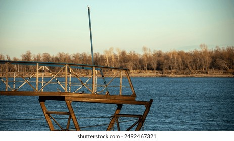 Rustic Pier Over Lake with Forest Background offers a serene retreat in untouched nature - Powered by Shutterstock