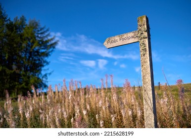 A Rustic Public Right Of Way Signpost In The Sunny Autumn Northumbrian Countryside, England, UK.