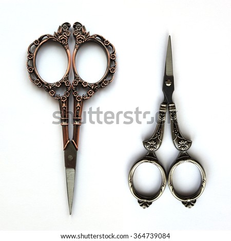 Rustic scissors isolated on white background. Vintage accessory for design. Mockup objects. 