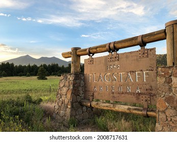 Rustic sign at the town limits of Flagstaff, Arizona
