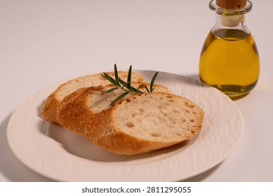 Rustic Sliced Artisan Bread with Olive Oil on White Plate, Cozy Food Photography