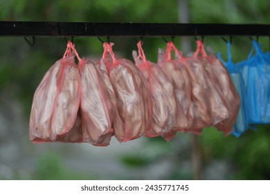 Rustic snacks hanging and wrapped in plastic