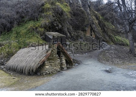 Rustic stone structure and dirt path in Arrowtown New Zealand