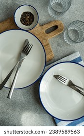Rustic table setting with white and blue stripe tableware