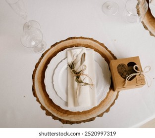 Rustic table setting with wood slice charger