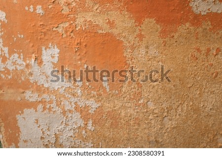 RUSTIC TERRACOTTA FLAKY PAINT BACKGROUND - Aged old worn flaking painted rough textured, ceramic red rusty orange earthy colored, detailed solid flat wall plastered background             