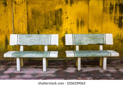 Rustic wall background park bench