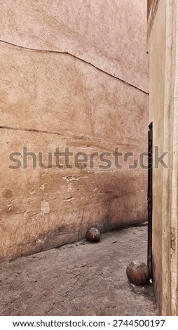 Rustic Wall With Two Canon Ball Decor