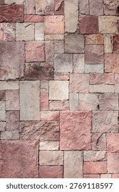 Rustic warm stone cladding wall texture with natural earthy tones.
