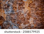 Rustic Weathered Stone Texture with Orange, Anthracite, Ochre, and Copper Tones – High-Contrast Rock Surface with Natural Patterns for Backgrounds and Design