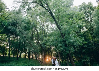 Rustic wedding couple in the forest 